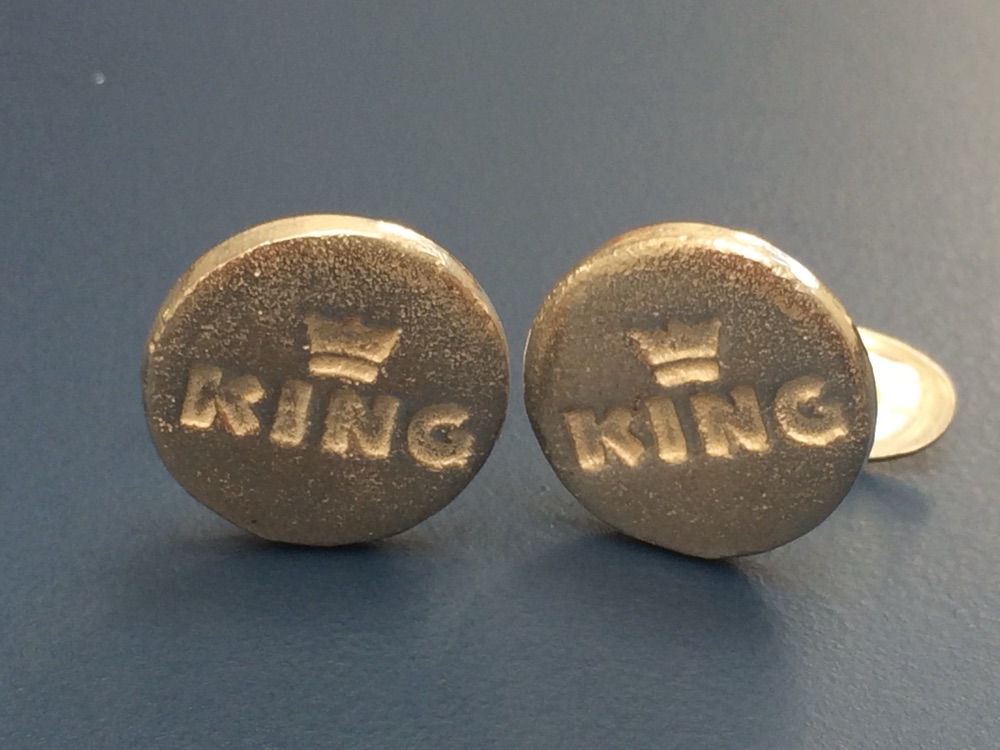 Manchetknopen voor een Koning