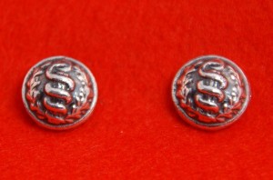 Zilver gegoten manchetknopen (knoop aesculaap)